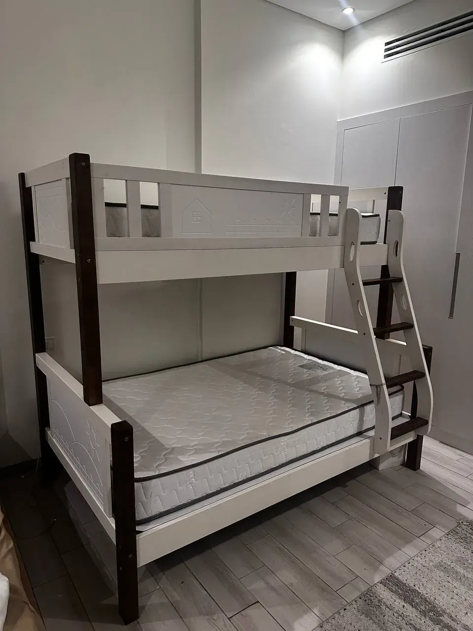 Modern bunk bed setup as an example of household furniture someone might give away or find as free stuff in the UAE