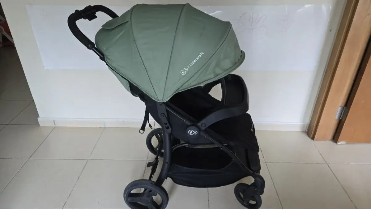 Baby stroller indoors, used as a general handover image for a baby item checklist Baby stroller indoors, used as a general handover image for a baby item checklist