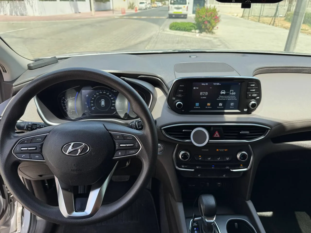 Hyundai car interior with steering wheel and dashboard, representing everyday items given a second life through community reuse