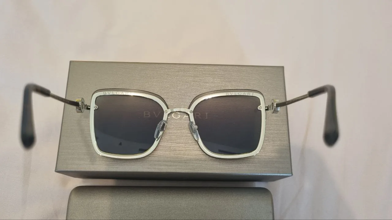 BVLGARI square sunglasses on a box, representing second‑hand fashion items in a peer‑to‑peer sharing platform