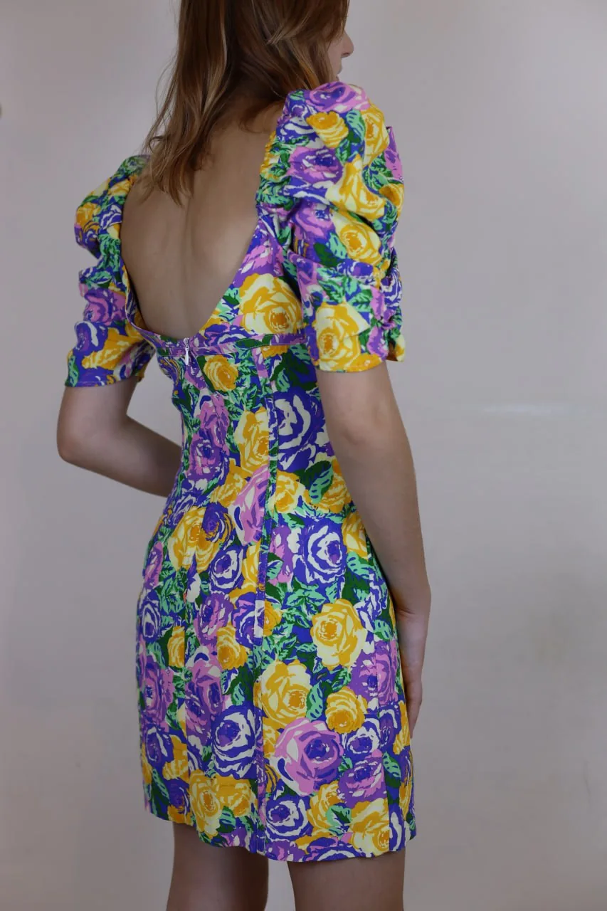 Back view of a person in a floral dress, suitable for a short-term sublet resident page